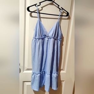 Short blue dress with ruffles